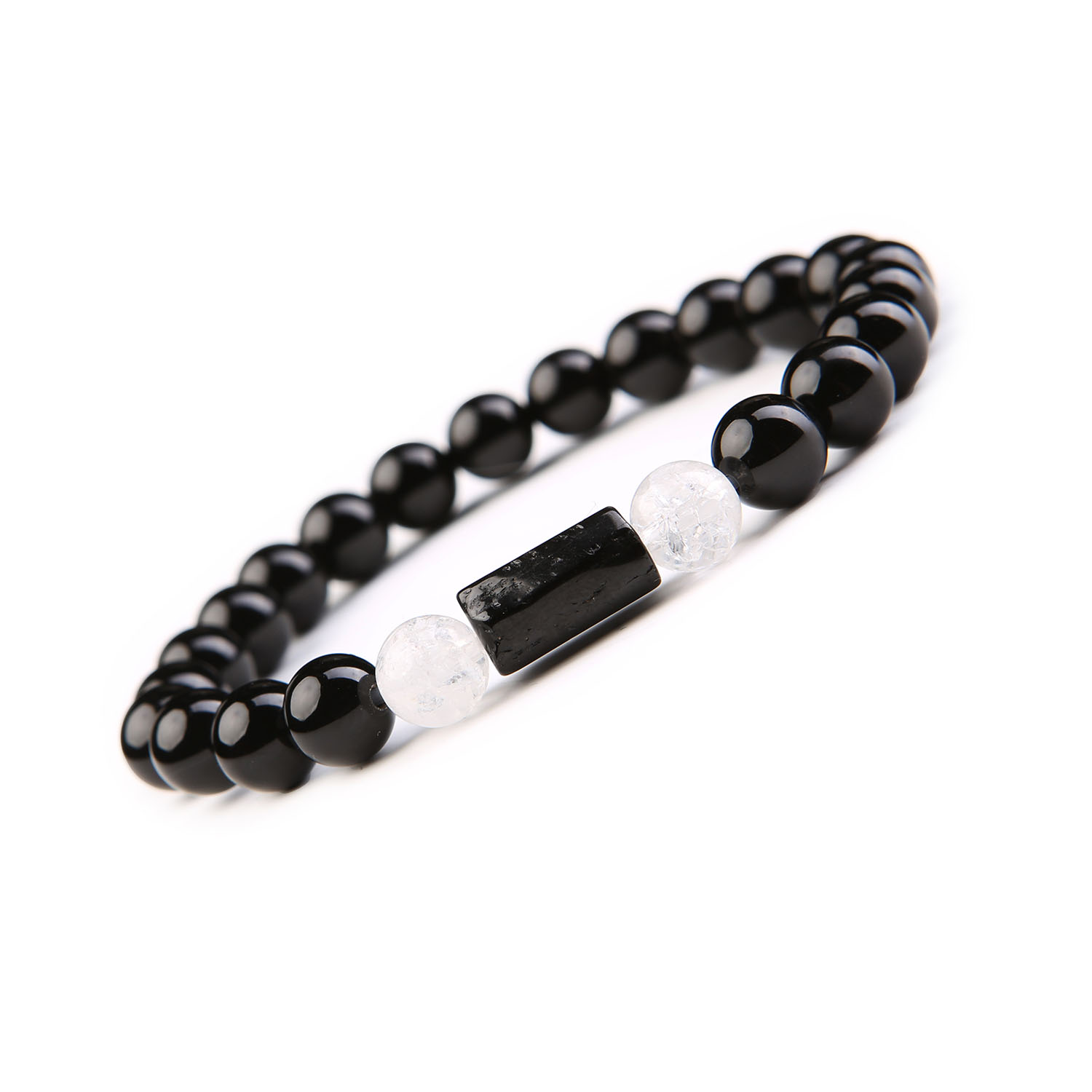 Bransoletka Arsil z Kamieni Naturalnych Kryształ Górski Lodowy, Turmalin, Onyks Bransoletka z kamieni naturalnych Arsil, składająca się z kryształu górskiego lodowego, turmalinu i onyksu, perfekcyjny dodatek do stylizacji.