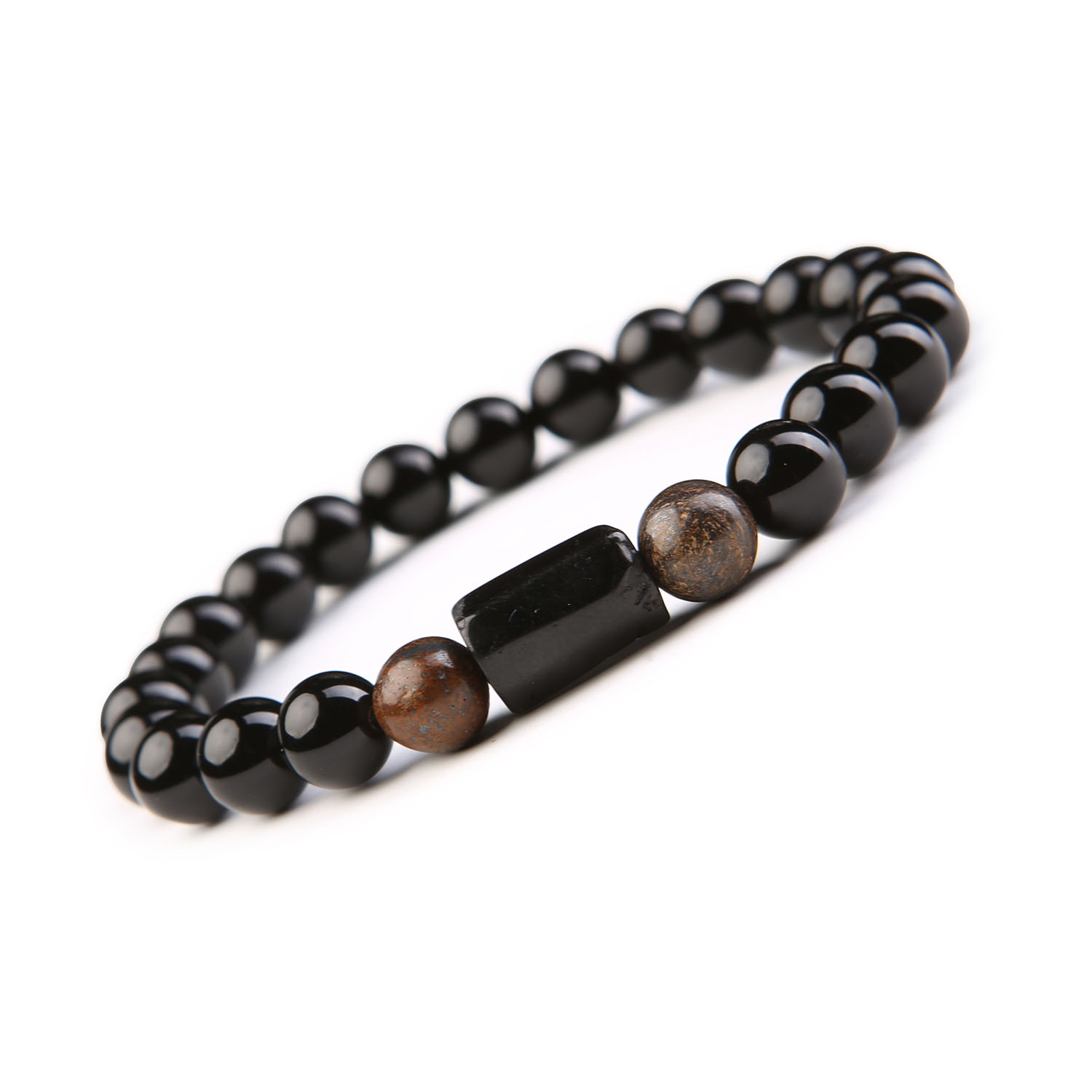 Bransoletka z Kamieni Naturalnych - Bronzyt, Turmalin i Onyks Kolekcja Arsil Elegancka bransoletka Arsil, w której zjawiskowy bronzyt harmonizuje z turmalinem i onyksem, tworząc wyjątkowy, artystyczny wygląd.