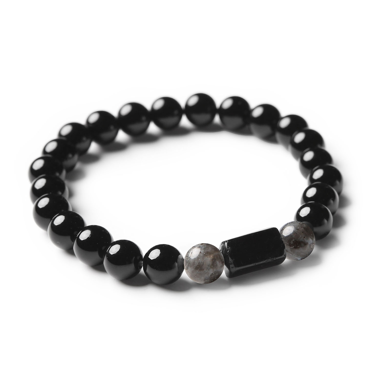 Oryginalna bransoletka z kamieni naturalnych, w której zjawiskowy larvikit harmonizuje z turmalinem i onyksem, tworząc unikalny projekt z kolekcji Arsil.