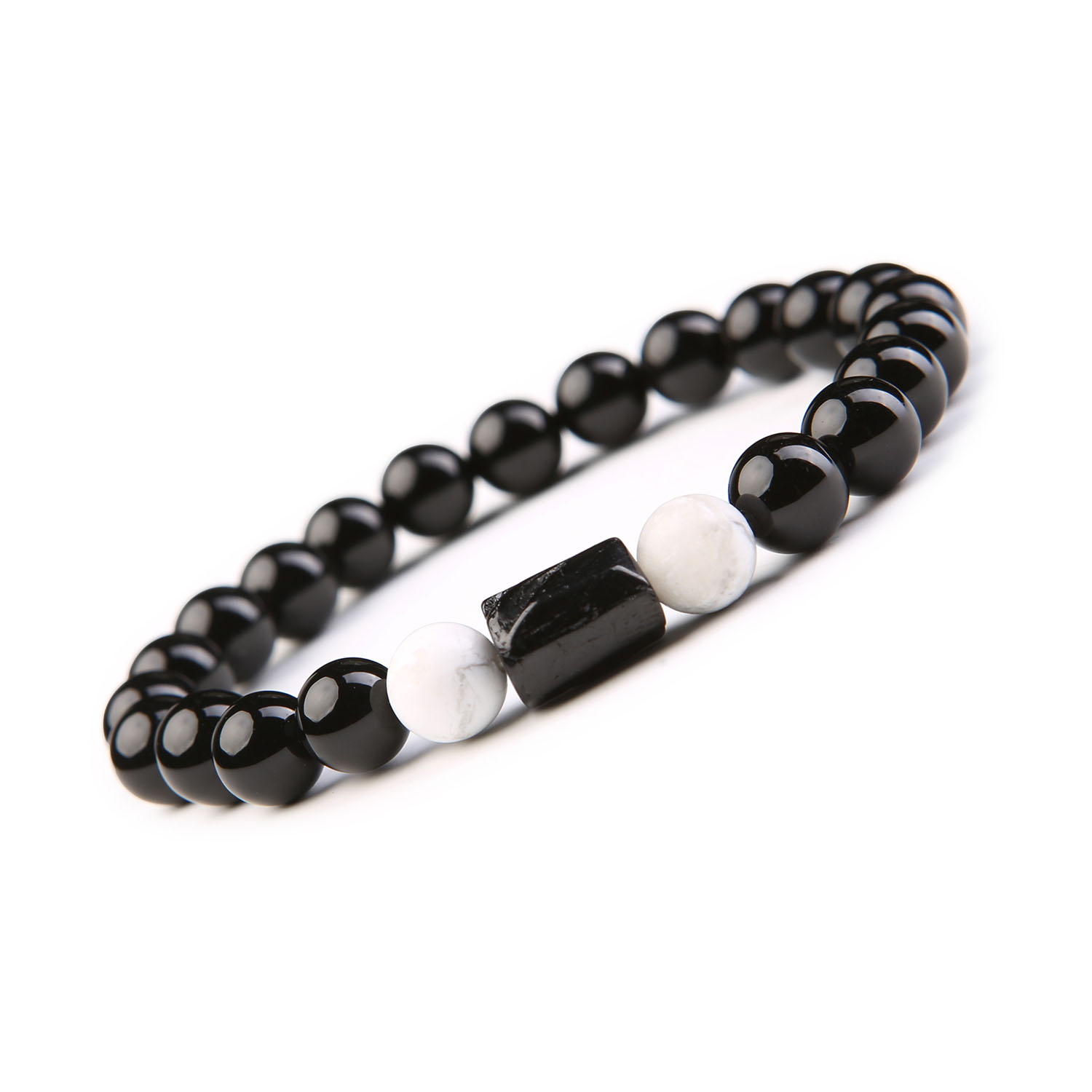 Bransoletka z Kamieni Naturalnych – Howlit Turmalin, Onyks. Kolekcja Arsil Bransoletka z howlitu jak nocne niebo, turmalinu jak krople deszczu i onksu jako głębia oceanu – niezwykłe połączenie naturalnych skarbów w kolekcji Arsil.