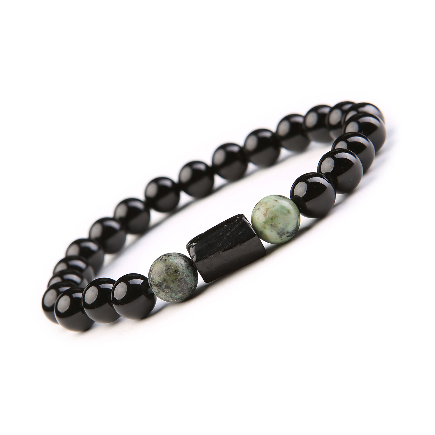 Bransoletka z Kamieni Naturalnych – Turkus Afrykański Turmalin, Onyks. Kolekcja Arsil Ekspresyjna bransoletka, gdzie intensywny turkus afrykański spotyka się z mocą turmalinu i głębią onksu – harmonijne połączenie energii i elegancji w kolekcji Arsil.