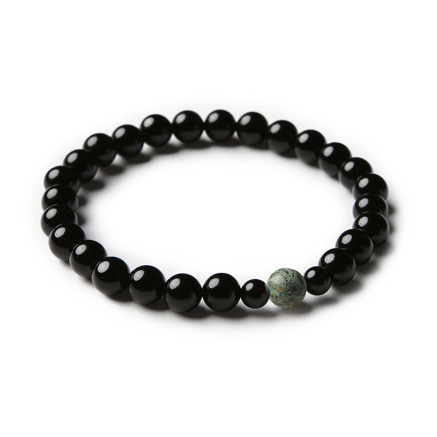 Elegancka bransoletka Binthe, łącząca turkus afrykański i onyks, dostępna w wersjach dla kobiet i mężczyzn.