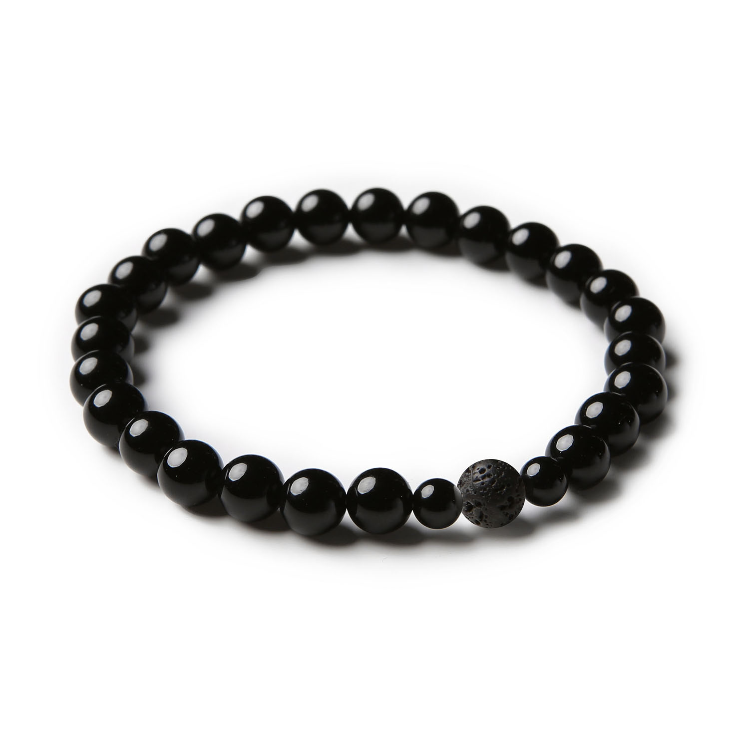 Elegancka bransoletka z kolekcji Binthe z lawy wulkanicznej i onyksu, dostępna zarówno dla pań, jak i panów.