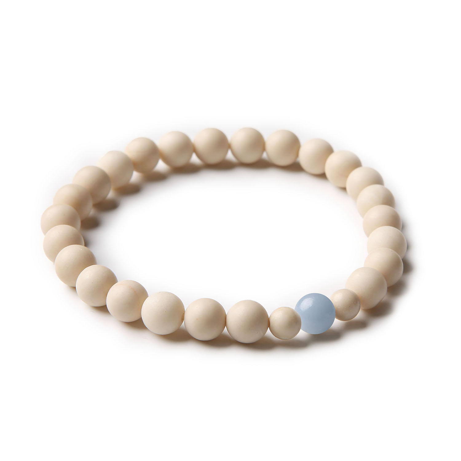 Stylowa bransoletka z kolekcji Binthe wykonana z naturalnych kamieni: angelit z Peru i kamień rzeczny, dostępna dla obu płci.