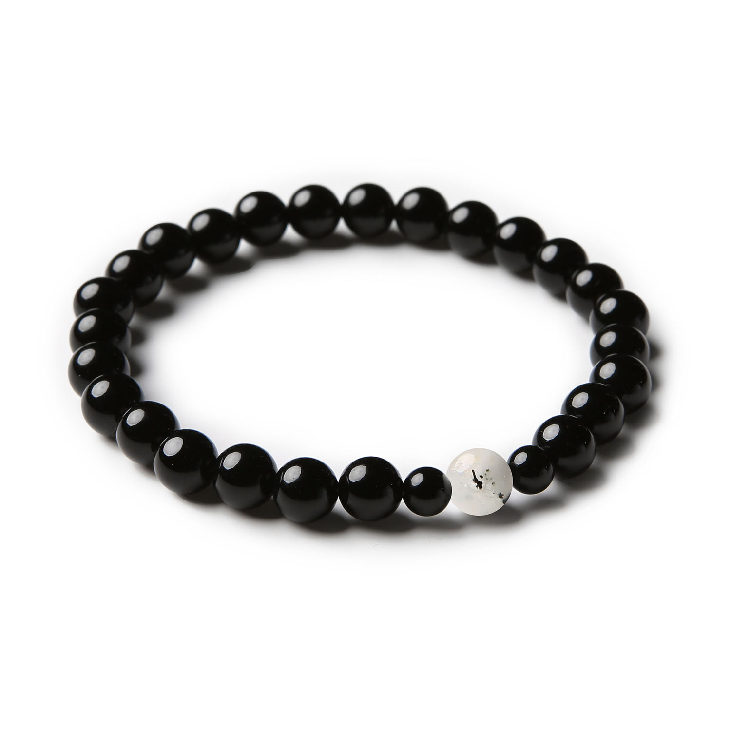 Elegancka bransoletka Binthe z kamieniem księżycowym łaciatym i onyksami, idealna zarówno dla kobiet, jak i mężczyzn.