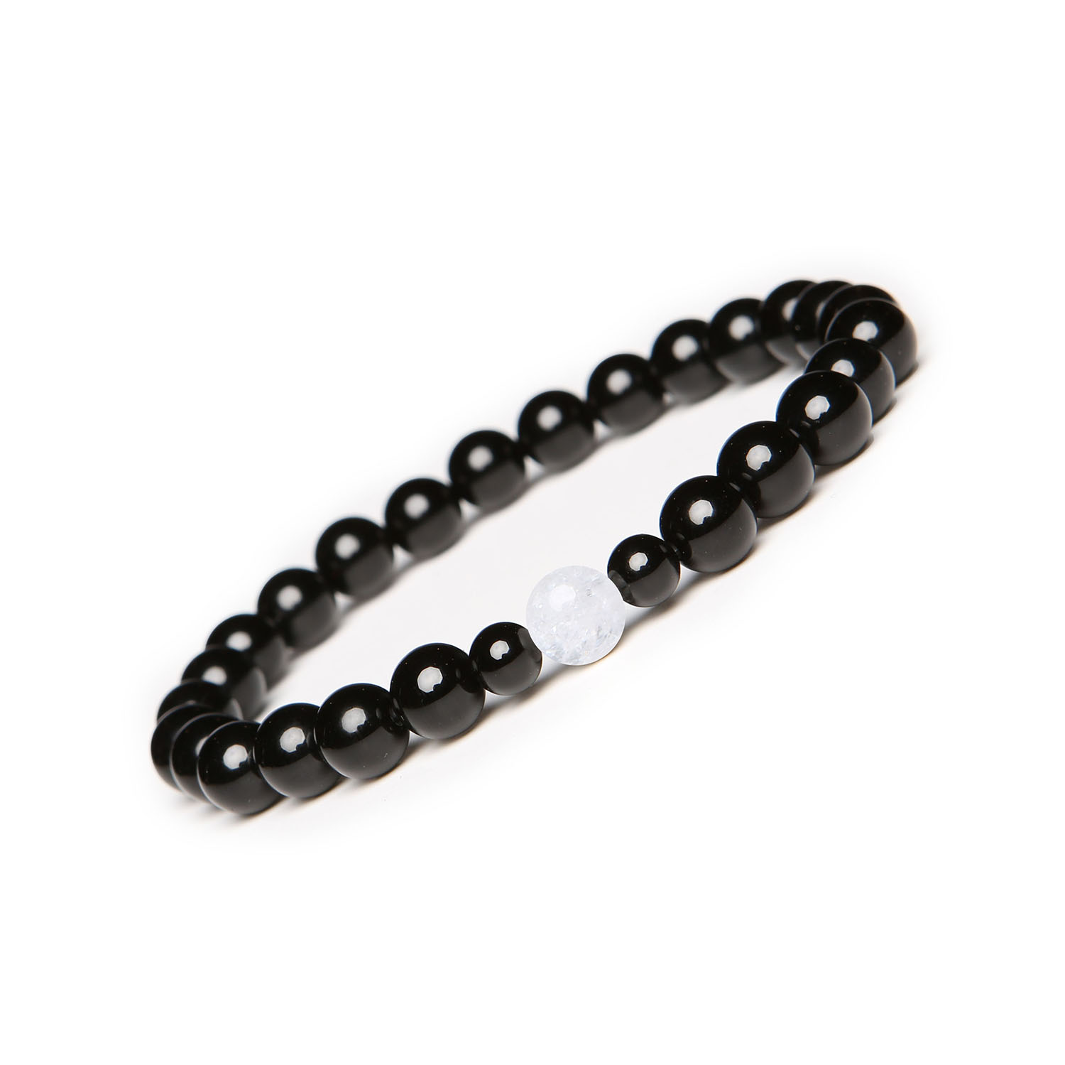 Kolekcja Binthe Damska i Męska bransoletka z Kryształem Górskim Lodowym oraz Onyksami Bransoletka z kolekcji Binthe, w wersji dla kobiet i mężczyzn, z elementami kryształu górskiego lodowego i onyksu.