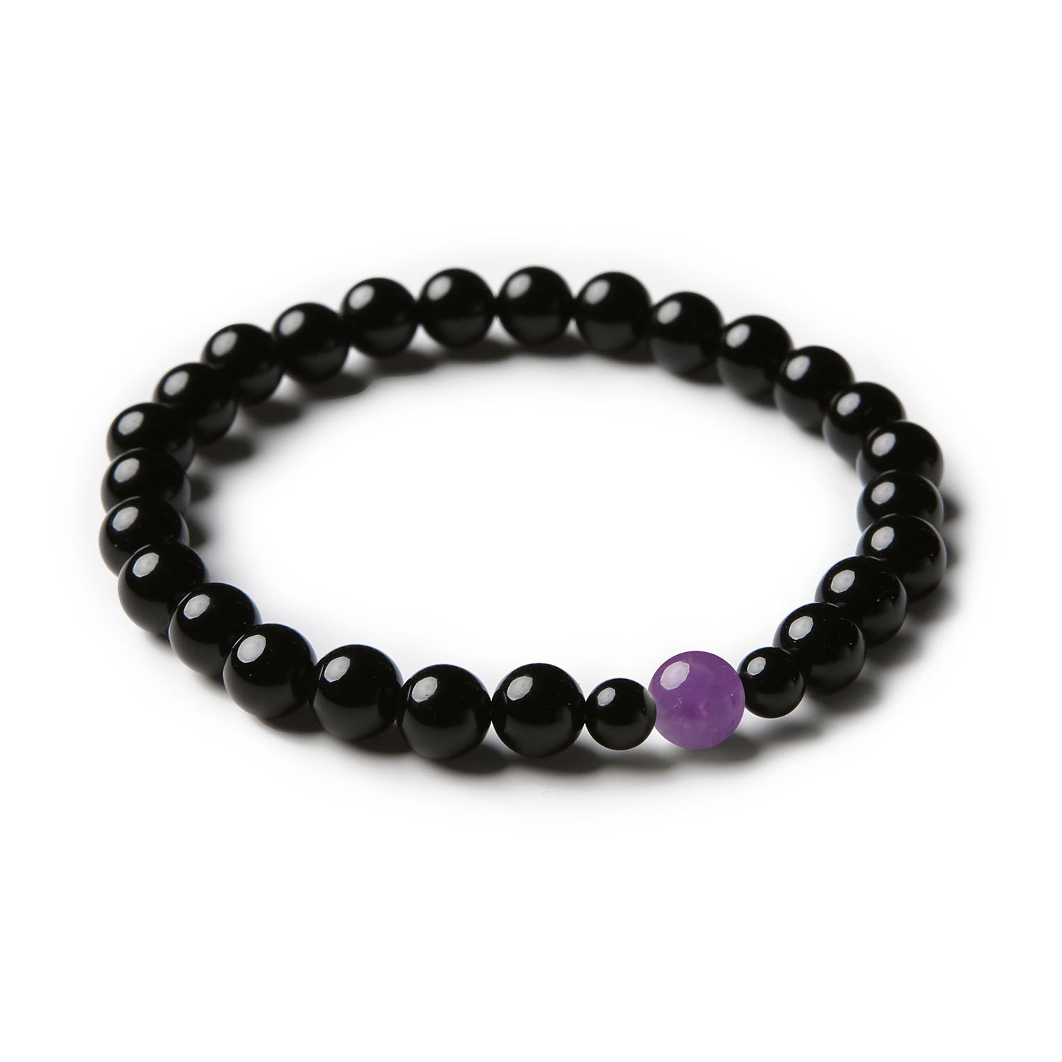 Uniwersalna bransoletka Binthe z ametystem i onyksem, pasująca zarówno do stylizacji damskich, jak i męskich.