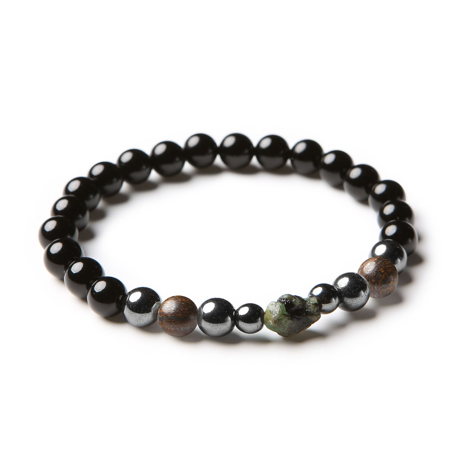 Elegancka bransoletka z kolekcji Elai, ozdobiona bronzytem, szmaragdem, onyksami i hematytem grafitowym, idealna dla kobiet i mężczyzn.