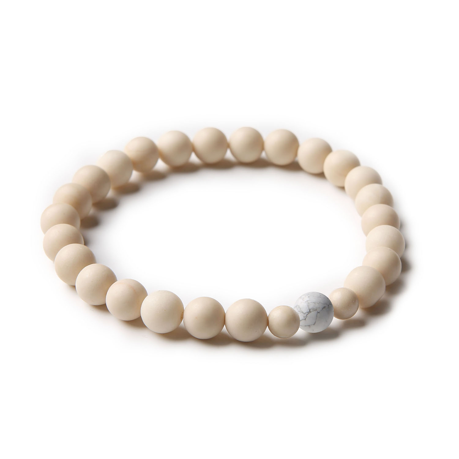 Bransoletka z kolekcji Binthe, wykonana z naturalnych kamieni - Howlit i Kamień Rzeczny, dostępna w wersji damskiej i męskiej.