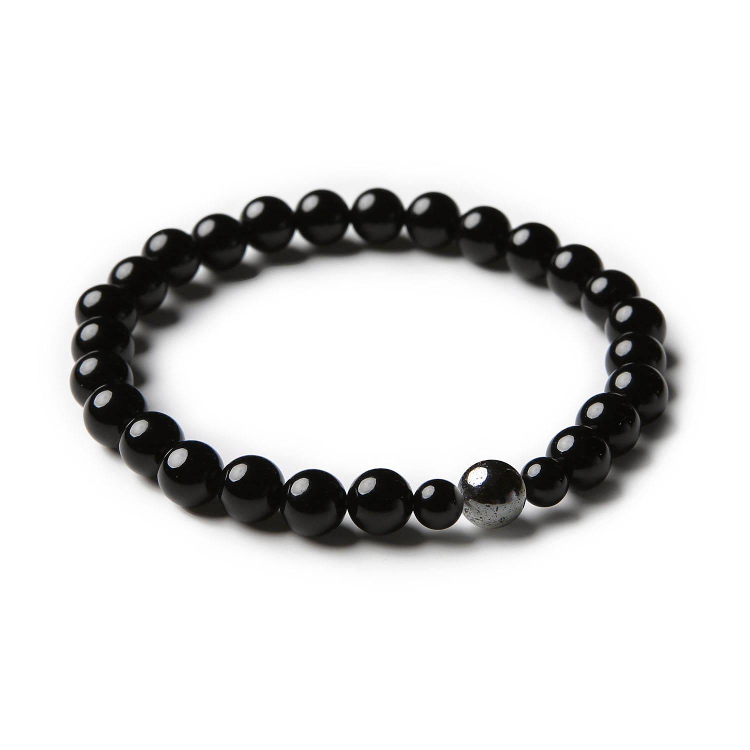 Bransoletka damska i męska z kolekcji Binthe, wykonana z hematytu grafitowego i onyksu.