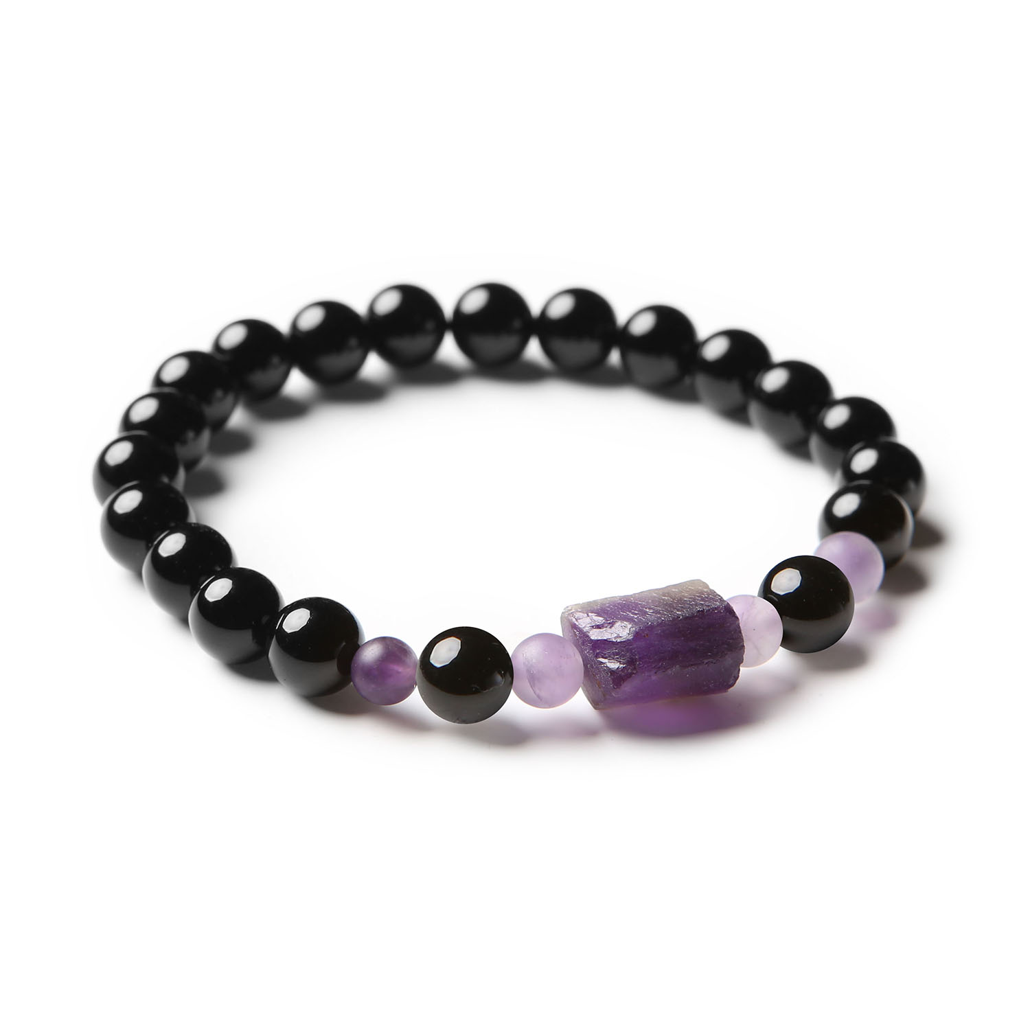 Elegancka bransoletka z kolekcji Kema z kamieniami naturalnymi: onyks oraz ametyst, odpowiednia dla obu płci.