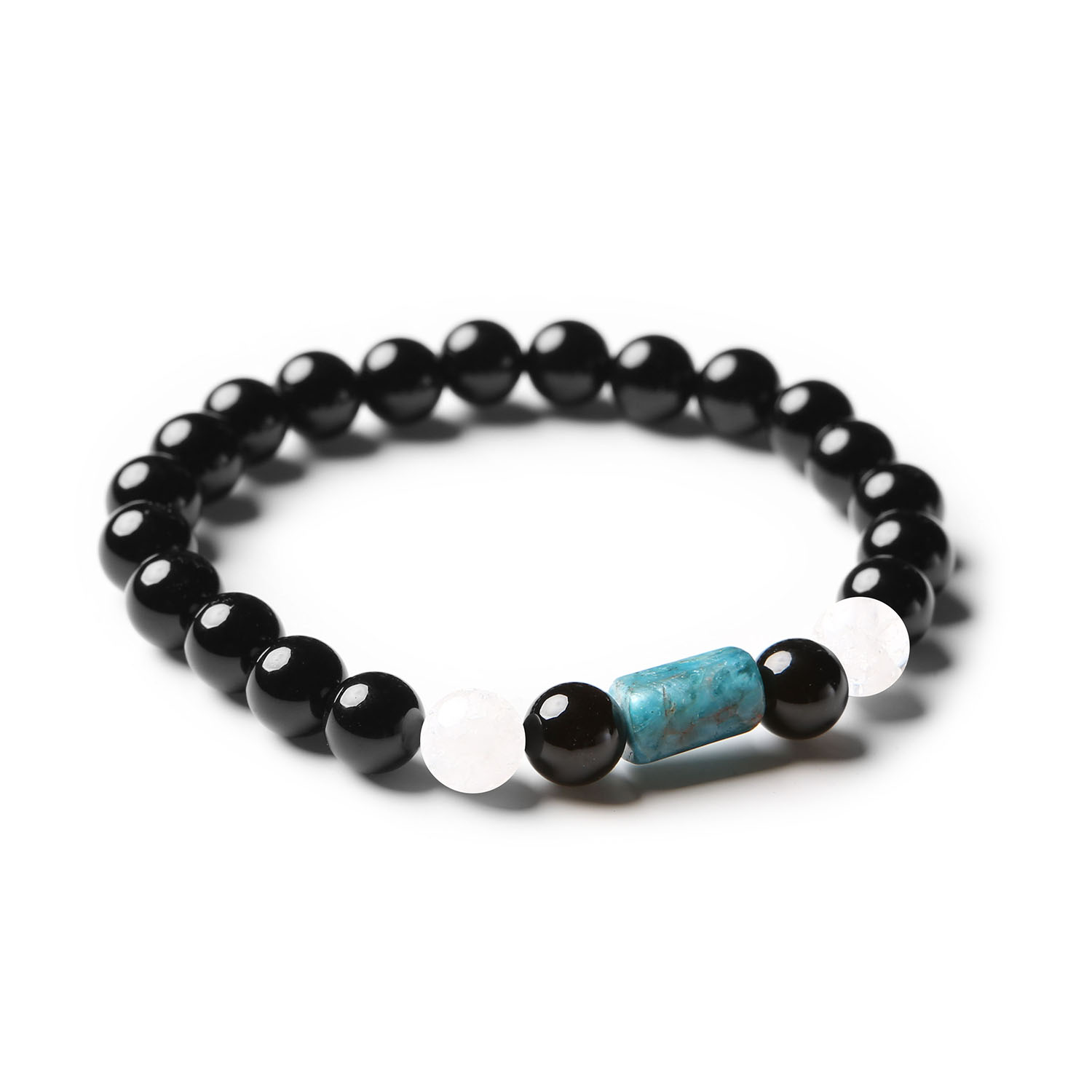 Elegancka bransoletka z kolekcji Laeri, składająca się z kryształu górskiego, apatytu i onyksu, dedykowana zarówno kobietom, jak i mężczyznom.