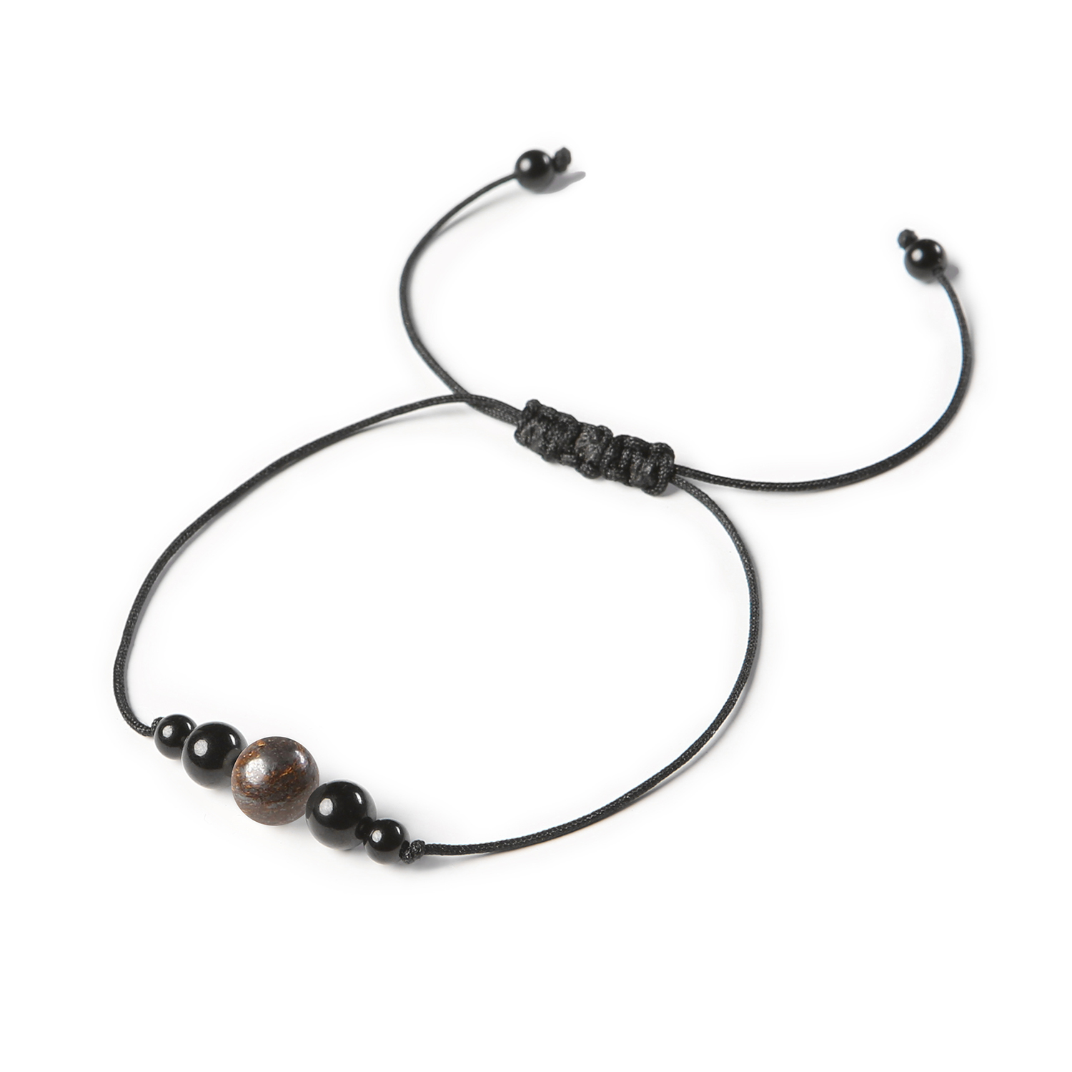 Bransoletka na sznurku Garie z bronzytem i turmalinem, dostępna w wersji damskiej i męskiej Bransoletka z kolekcji Garie: wyjątkowe połączenie bronzytu i turmalinu, styl idealny zarówno dla kobiet, jak i mężczyzn.