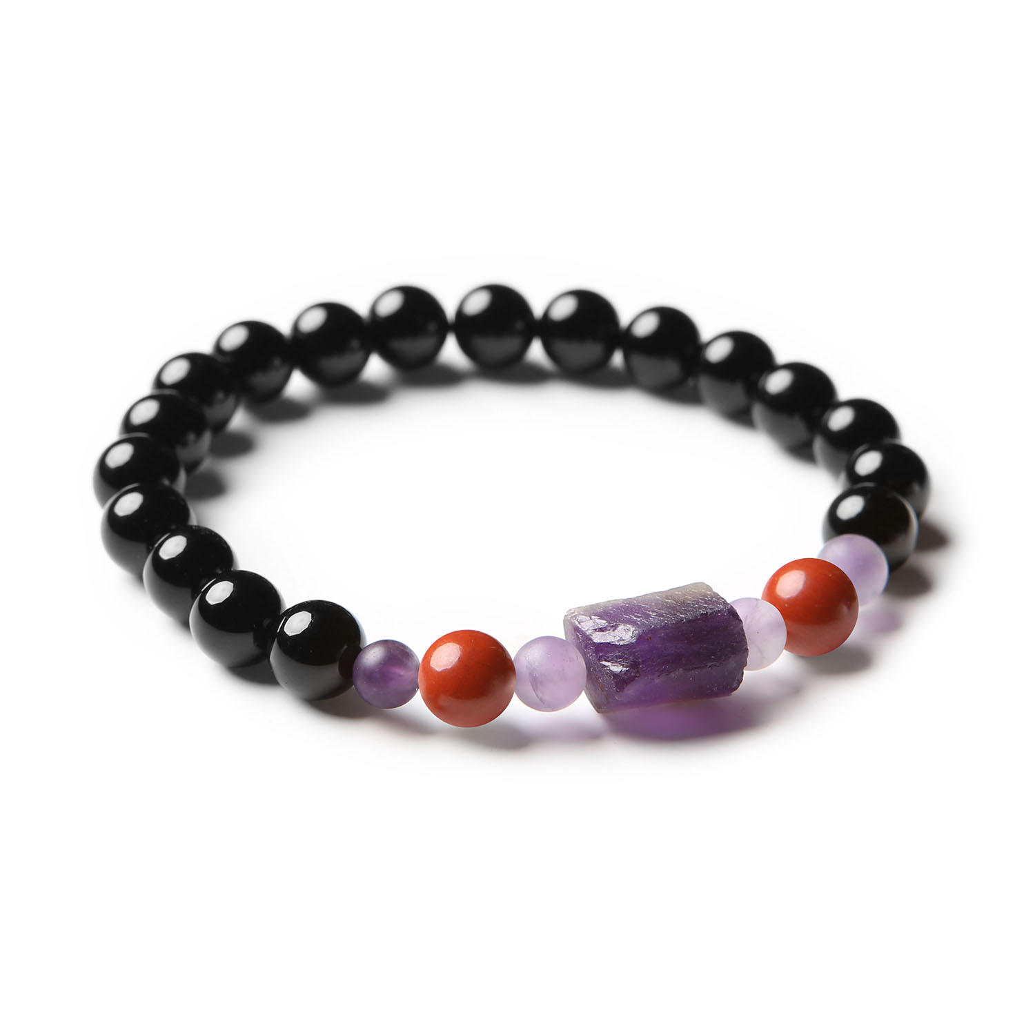 Stylowa bransoletka z kolekcji Kema, wykonana z jaspisu czerwonego, ametystu i onyksu - idealna dla niego i dla niej.