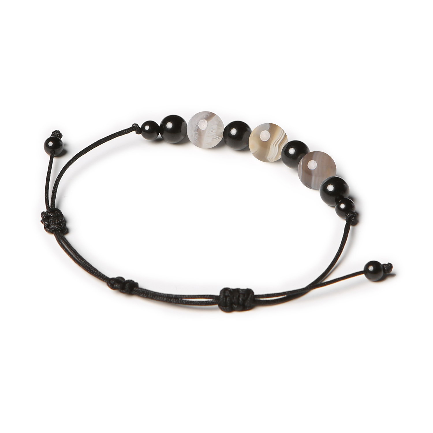 Elegancka bransoletka Haka wykonana z naturalnych kamieni, takich jak agat Botswana i turmalin, idealna zarówno dla kobiet, jak i mężczyzn.