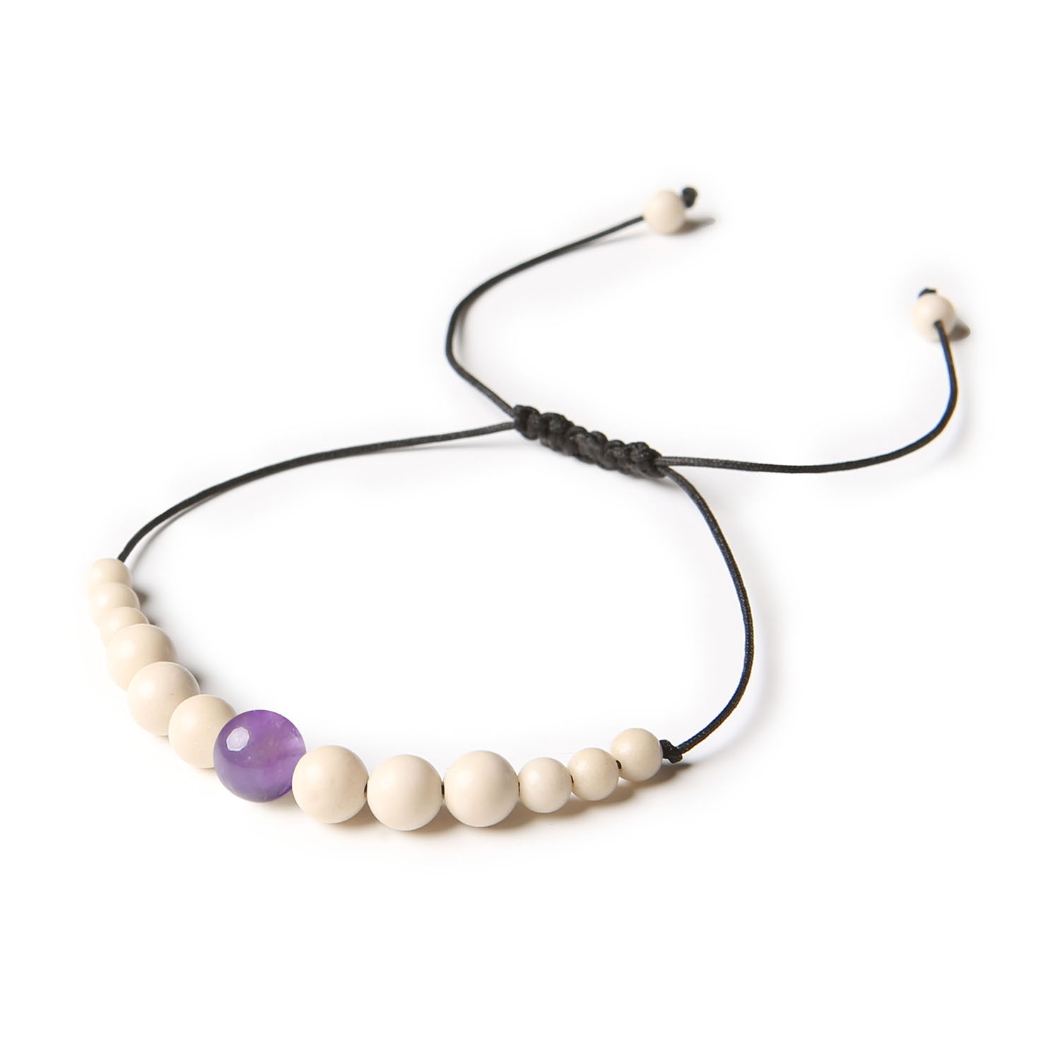 Bransoletka na sznurku z kolekcji Jaue z ametystem i kamieniem rzecznym, dla niej i dla niego Bransoletka Jaue z kamieniami naturalnymi, w tym ametystem i kamieniem rzecznym, unisex.