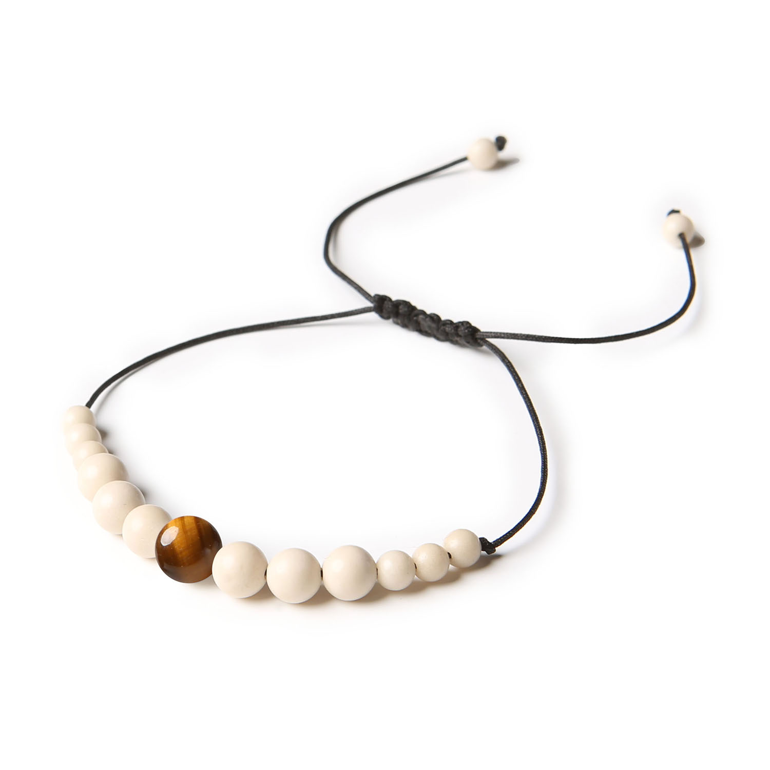 Damska i męska bransoletka Jaue na sznurku z Tygrysim Okiem oraz Kamieniem Rzecznym Damska i męska bransoletka z kamieniami tygrysiego oka oraz kamienia rzecznego z kolekcji Jaue.