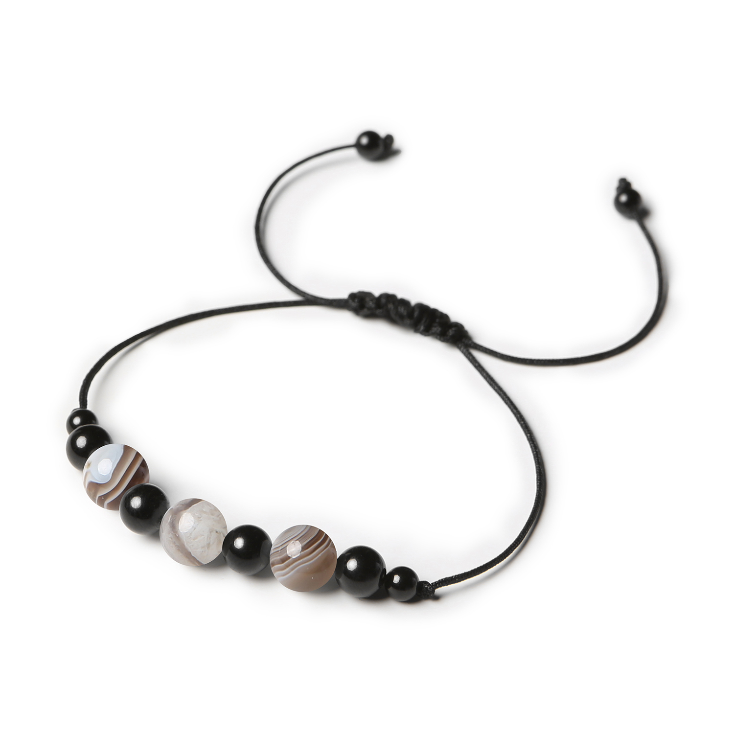Damska i męska bransoletka na sznurku Haka, wykonana z Agatu Botswana i Turmalinu Stylowa bransoletka z kolekcji Haka z kamieniami naturalnymi: agat Botswana oraz turmalin, przeznaczona dla kobiet i mężczyzn.