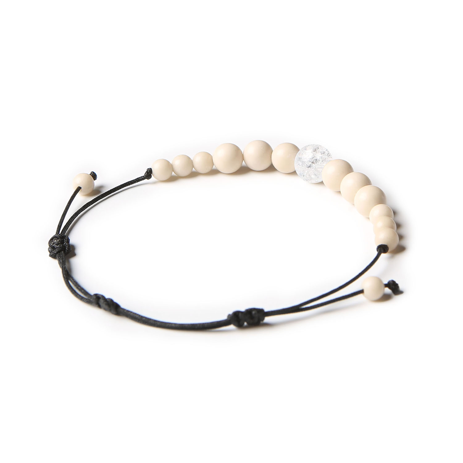 Bransoletka z naturalnych kamieni Kryształ Górski Lodowy i Kamień Rzeczny z kolekcji Jaue, dostępna dla pań i panów.