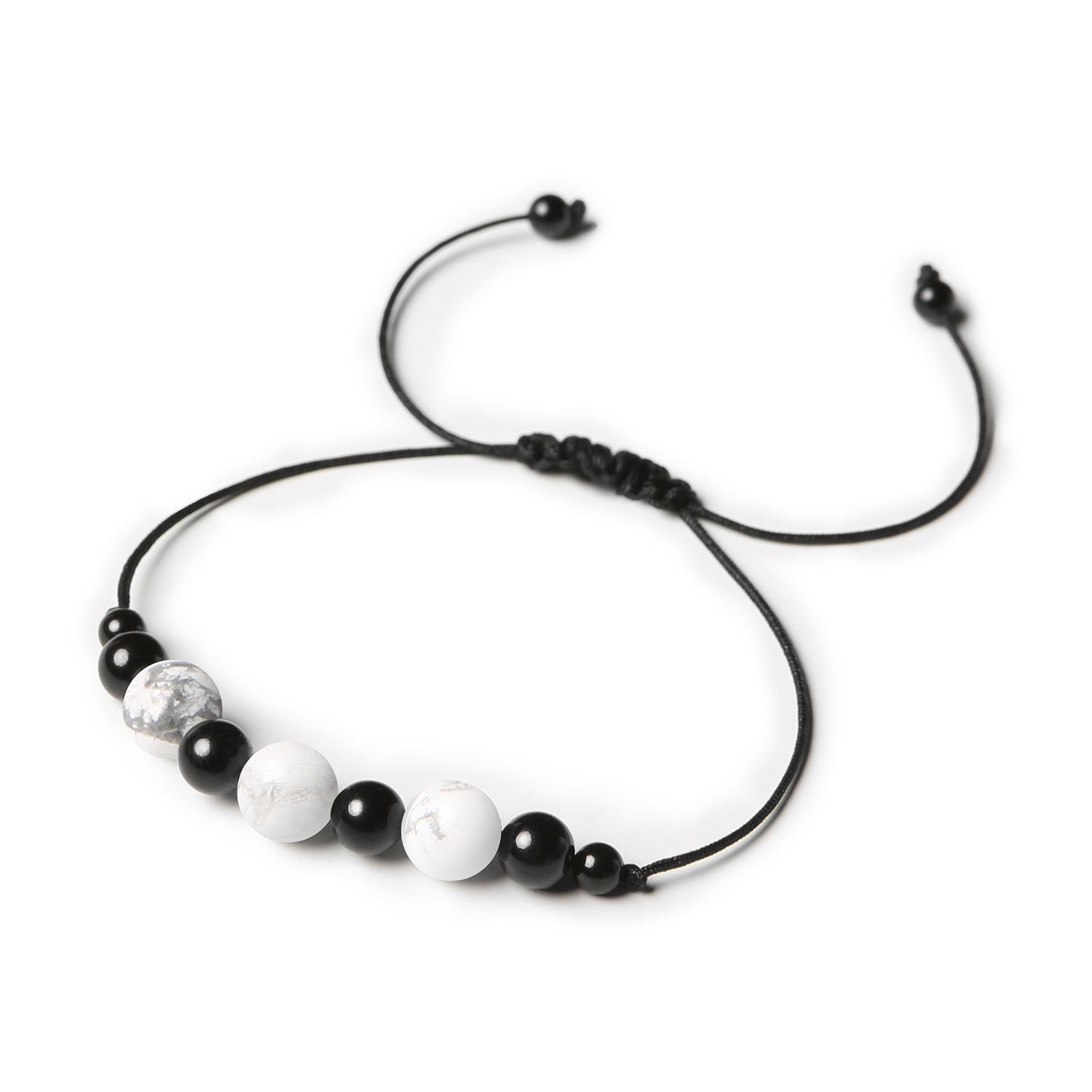 Damska i męska bransoletka z kolekcji Haka, jakowita z howlitem i turmalinem Kolekcjonerska bransoletka Haka z kamieniami naturalnymi: howlit i turmalin, przeznaczona dla wszystkich płci.