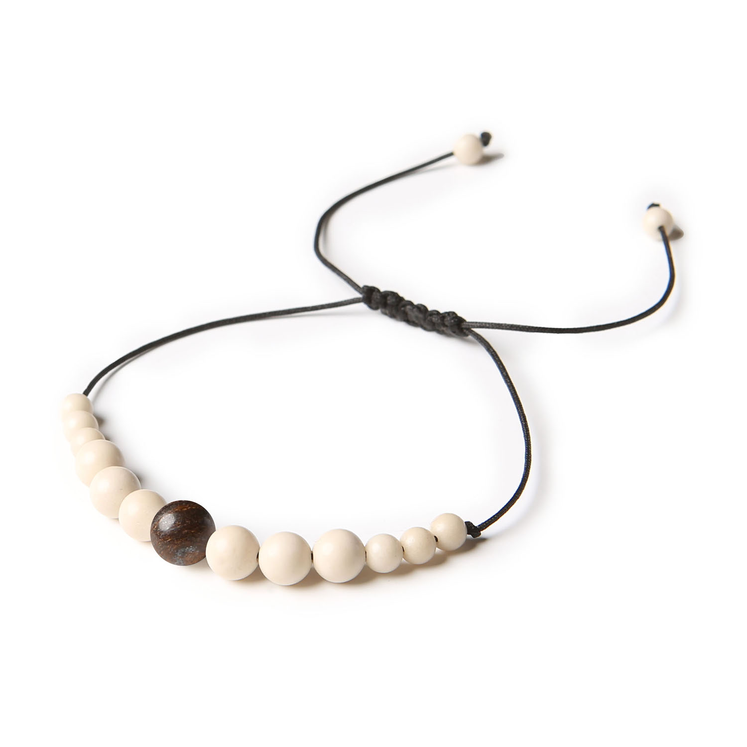 Elegancka bransoletka na sznurku z kolekcji Jaue - bronzyt i kamień rzeczny, unisex Stylowa bransoletka unisex z kolekcji Jaue, zdobiona kamieniami naturalnymi: bronzytem i kamieniem rzecznym.