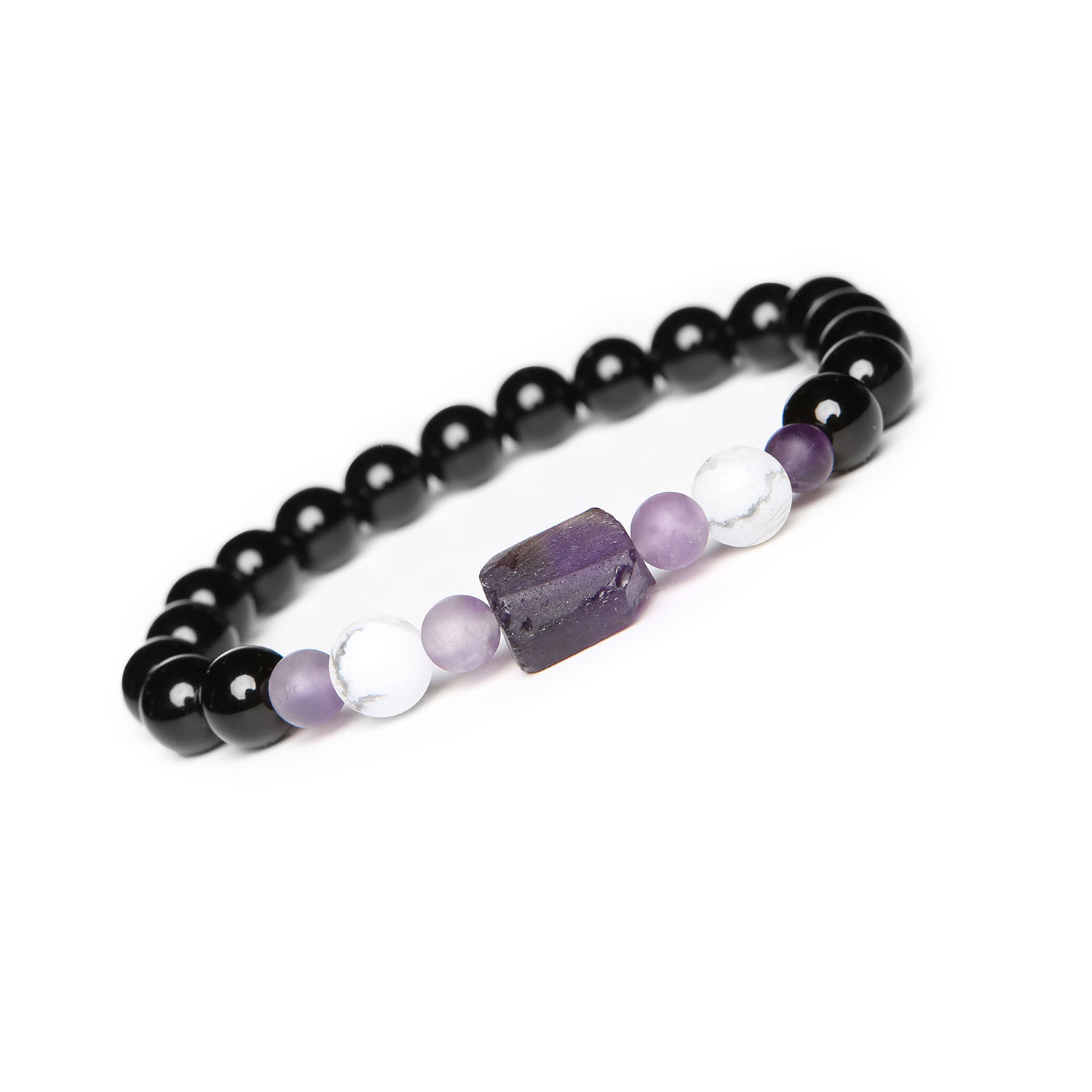 Kolekcja Kema bransoletka na sznurku z howlitem, ametystem i onyksem, idealna dla obu płci Bransoletka damska i męska z kolekcji Kema z naturalnych kamieni: howlit, ametyst i onyks.