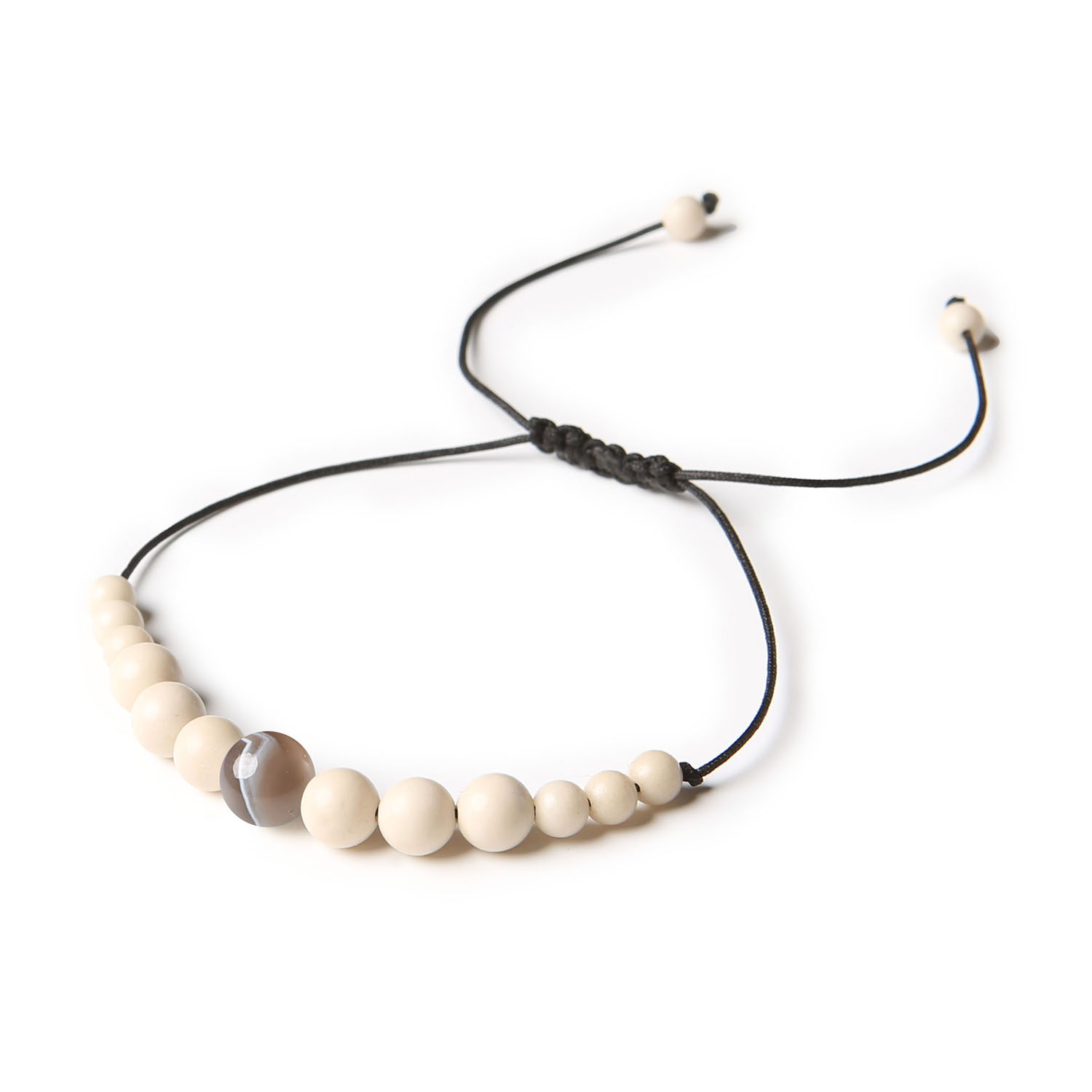 Kolekcjonerska bransoletka Jaue na sznurku z Agatem Botswana i Kamieniem Rzecznym, uniwersalna dla kobiet i mężczyzn Bransoletka Jaue z naturalnymi kamieniami: Agat Botswana i Kamień Rzeczny, dostępna w wersji damskiej i męskiej.