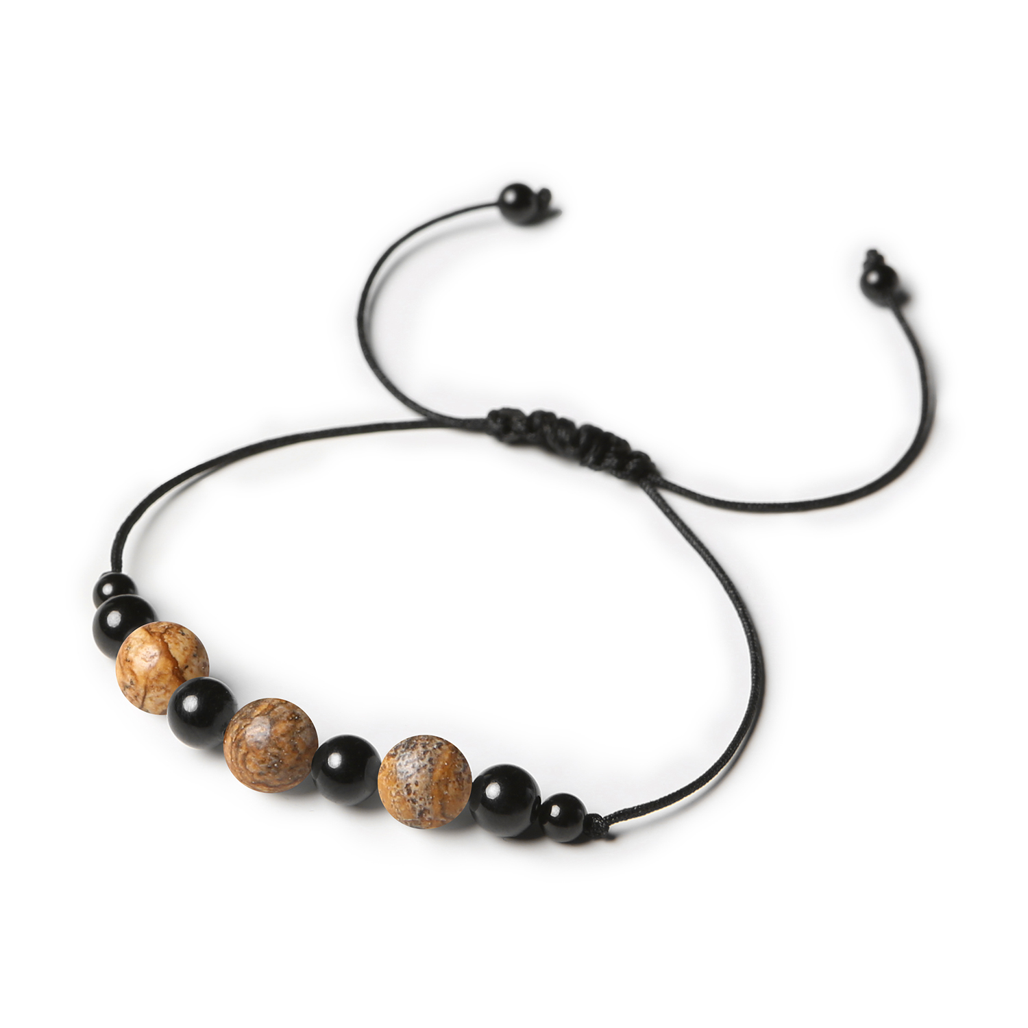 Stylowa bransoletka na sznurku Haka z Jaspisem Obrazkowym oraz Turmalinem, unisex Bransoletka z kolekcji Haka wykonana z naturalnych kamieni: jaspis obrazkowy i turmalin, dostępna w wersji damskiej oraz męskiej.