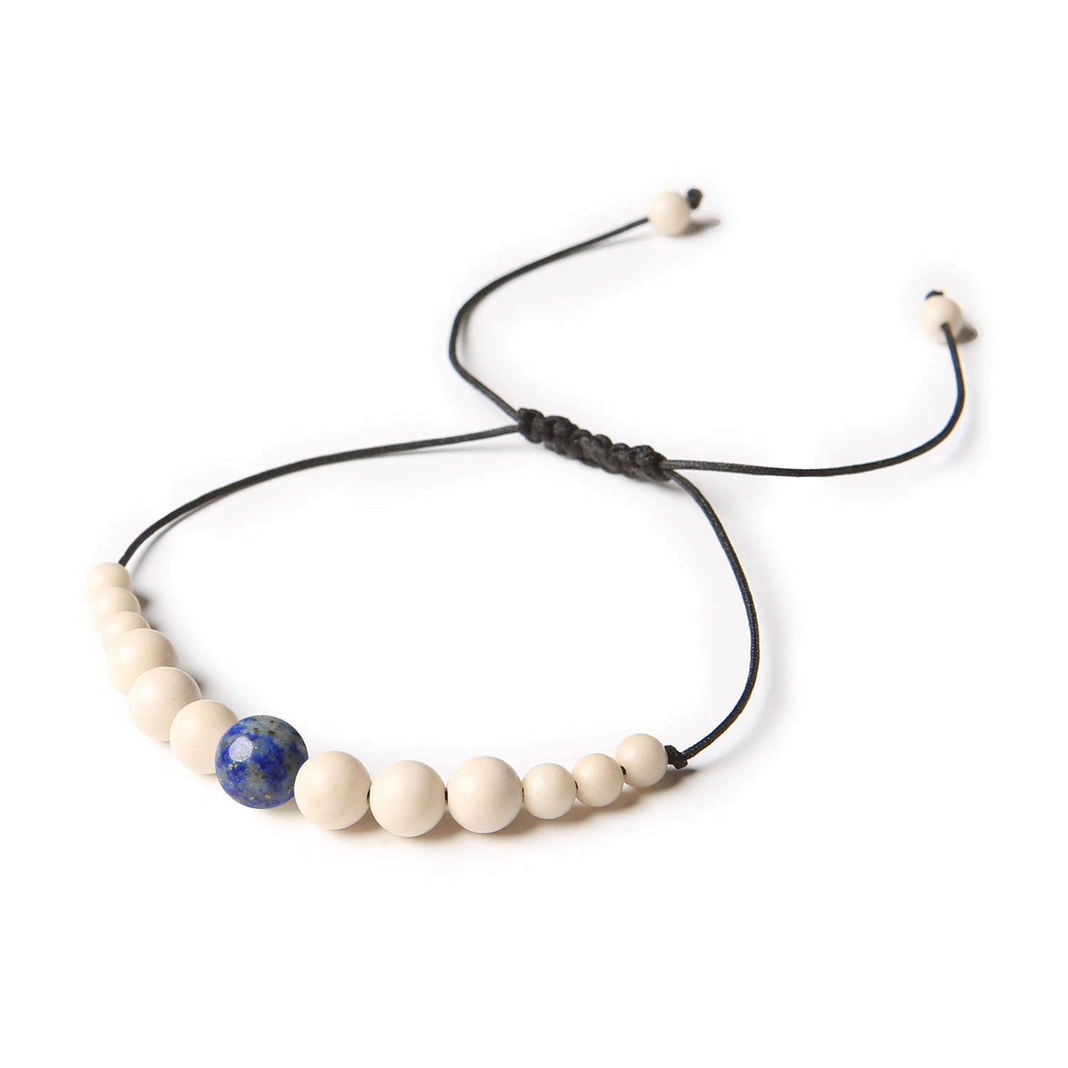 Unikalna bransoletka na sznurku z Lapis Lazuli i Kamieniem Rzecznym, dostępna dla kobiet i mężczyzn Bransoletka damska i męska z kolekcji Jaue, wykonana z naturalnych kamieni: Lapis Lazuli i kamienia rzecznego.