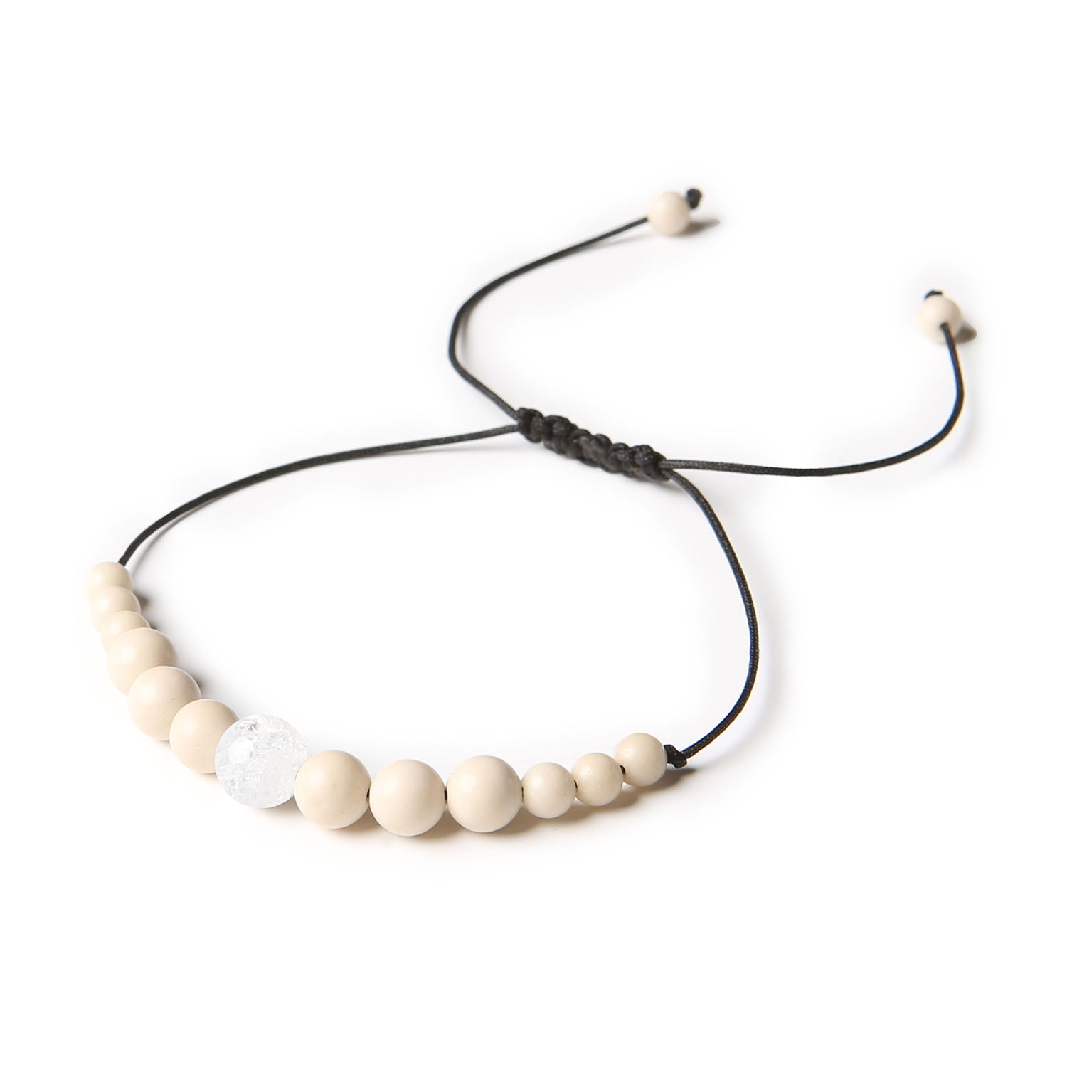 Unikalna bransoletka z Kryształem Górskim Lodowym i Kamieniem Rzecznym z kolekcji Jaue, dostępna dla kobiet i mężczyzn Bransoletka damska i męska z kolekcji Jaue wykonana z naturalnych kamieni: Kryształ Górski Lodowy i Kamień Rzeczny.