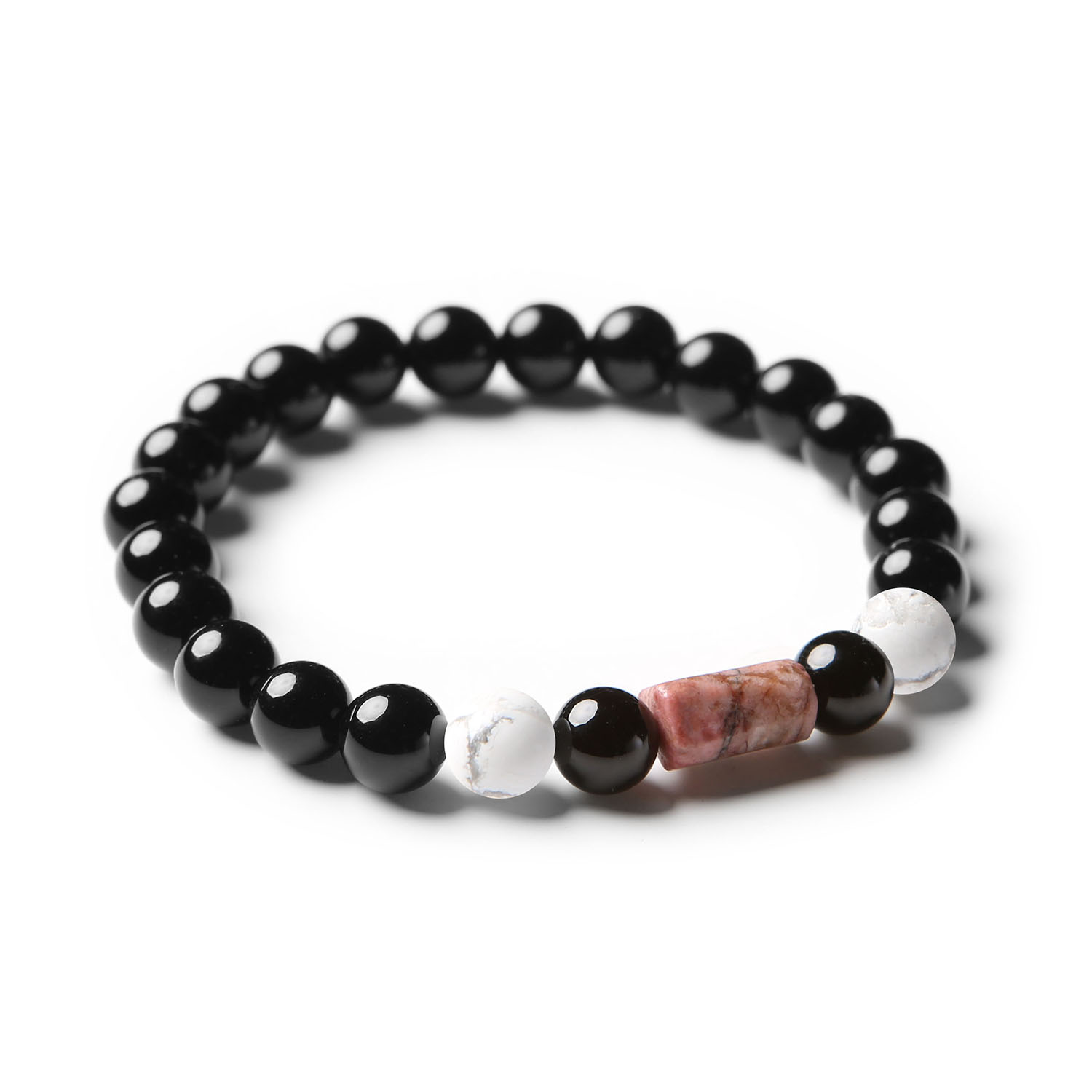 Elegancka bransoletka z kolekcji Laeri, wykonana z howlitów, różowego rodonitu i onyksu, idealna dla obu płci.