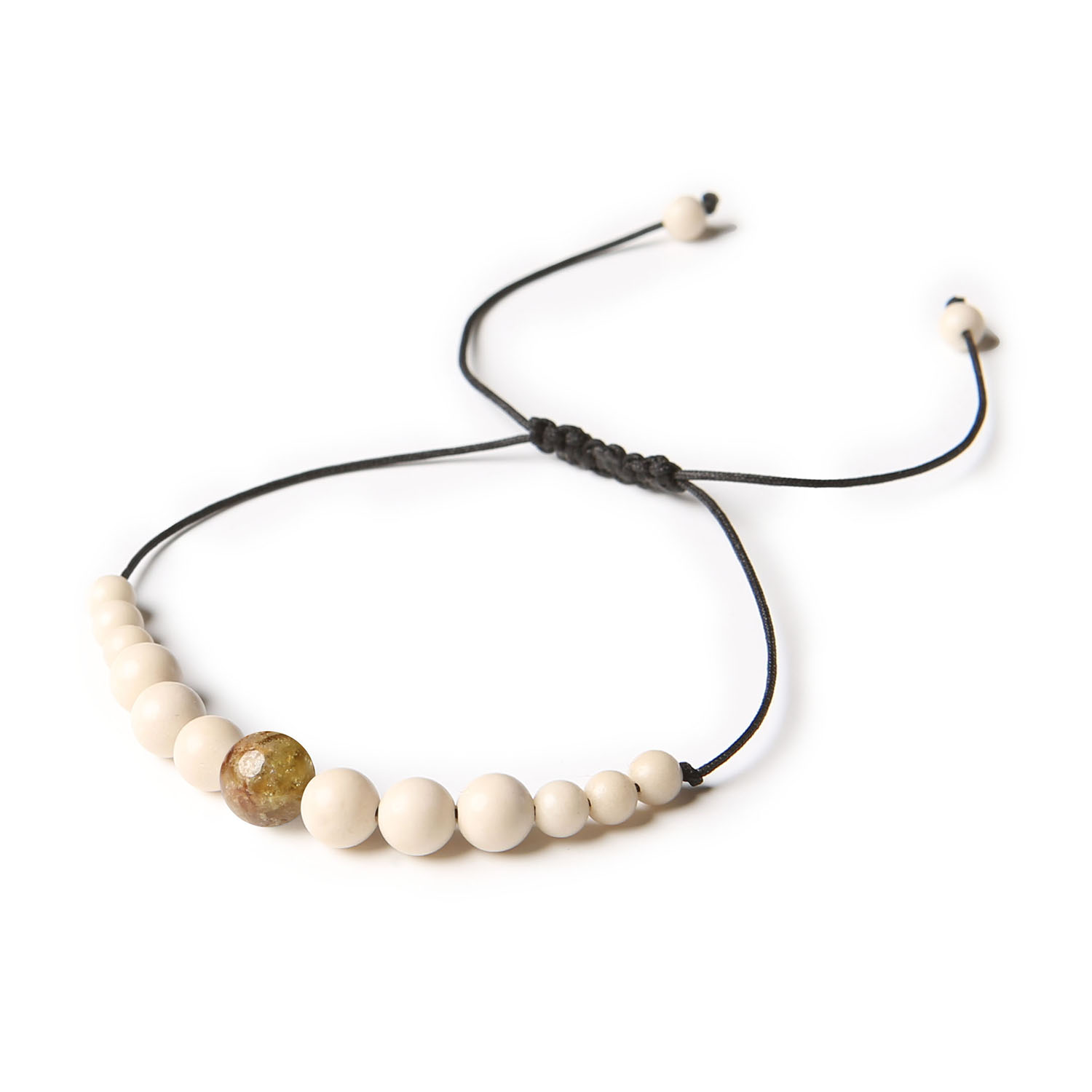 Elegancka bransoletka na sznurku Jaue, granatowo-zielona z naturalnym kamieniem rzecznym, idealna dla każdego Zielona granatowa bransoletka z kamieniami rzecznymi z kolekcji Jaue, unisex, doskonała zarówno dla kobiet, jak i mężczyzn.