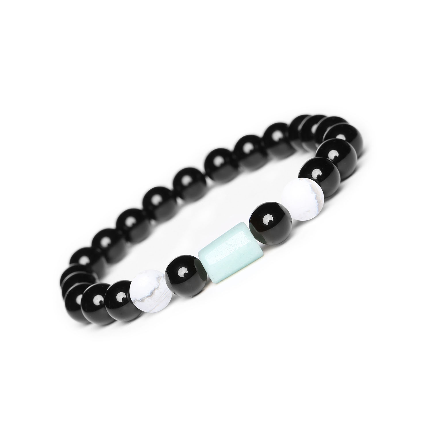 Kolekcja Laeri - bransoletka na gumce z howlitem, amazonitem i onyksami, idealna dla kobiet i mężczyzn Kolekcja Laeri: bransoletka z kamieniami naturalnymi – howlit, amazonit i onyks, stworzone z myślą o kobietach i mężczyznach.