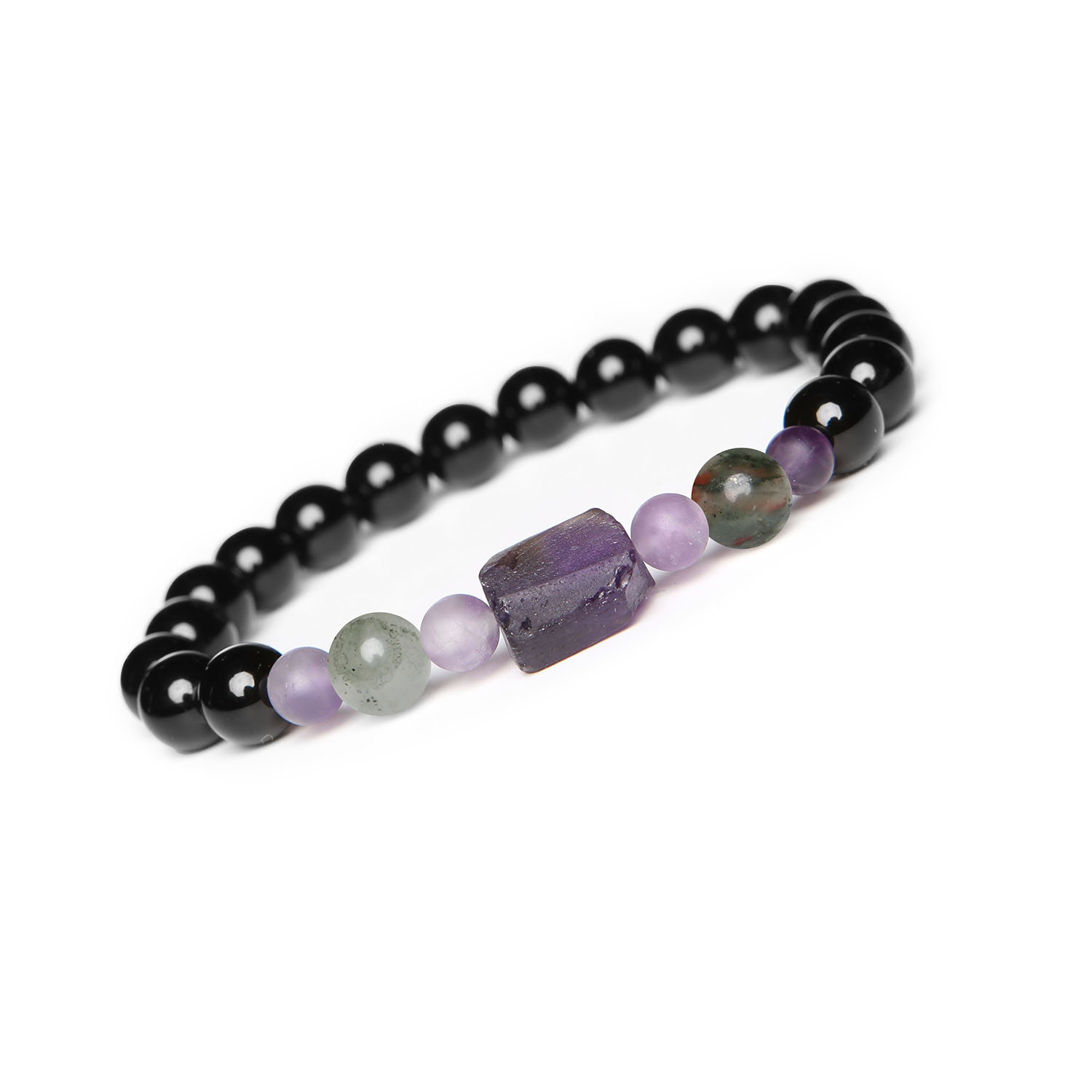 Unikalna bransoletka na gumce z kolekcji Kema, z heliotropem, ametystem i onyksem, dla wszystkich Bransoletka wykonywana z kamieni naturalnych z kolekcji Kema. Wyjątkowe zestawienie Heliotropu, Ametystu i Onyksu. Idealna dla Kobiet i Mężczyzn.