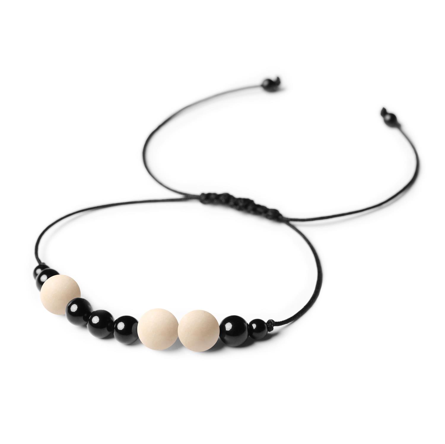 Bransoletka z kamieni naturalnych na sznurku Orila Kamień Rzeczny Turmalin dla kobiet i mężczyzn Kolekcja Orila: bransoletka z kamieni naturalnych, w tym kamień rzeczny i turmalin, odpowiednia dla kobiet i mężczyzn.